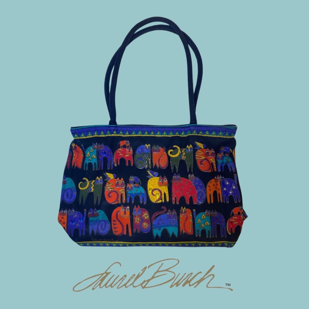 LAUREL BURCH Zippered Hand Bag.